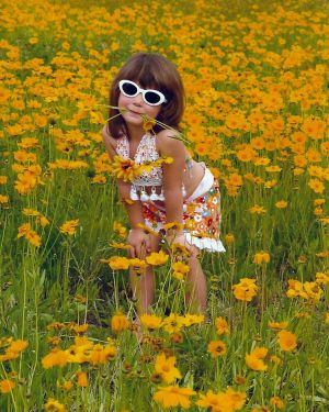 Allie the Daisy Girl Toddler Portrait in Daisy Field